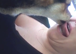 Zoophile MILF with fat tits wants dog kisses